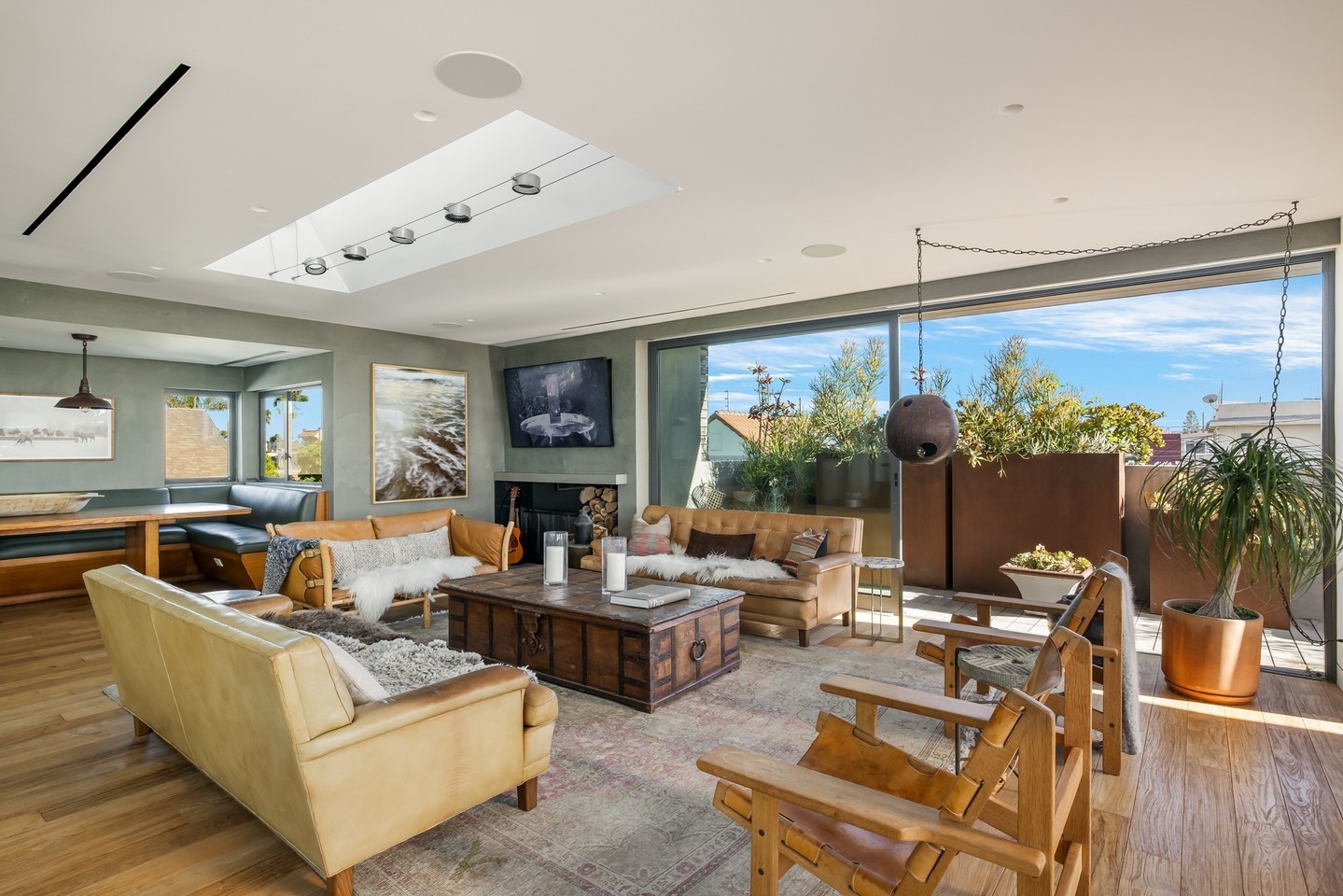 This rare 2-story 12,237 SF modern estate works beautifully as...